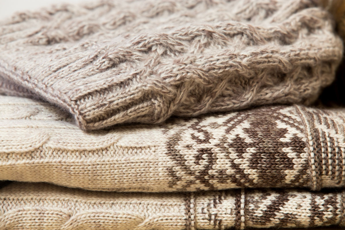 The Loom and Peak knited-clothes-stacked